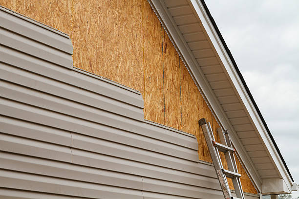 Professional Siding technician working in Armbrust, PA